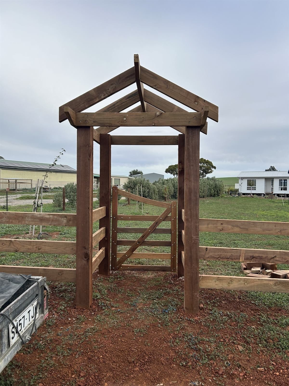 A timber entrance arbour by Aston Rural Enterprises.