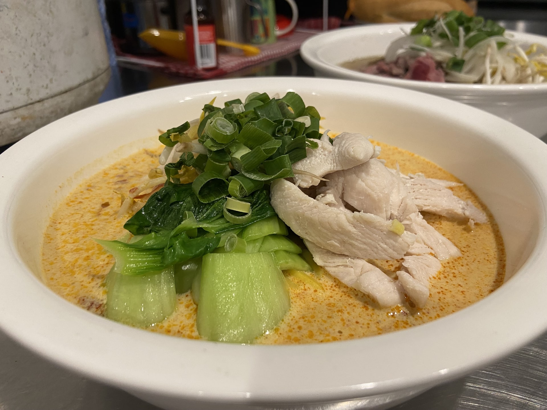 A bowl of chicken laksa from Asian Tucker.
