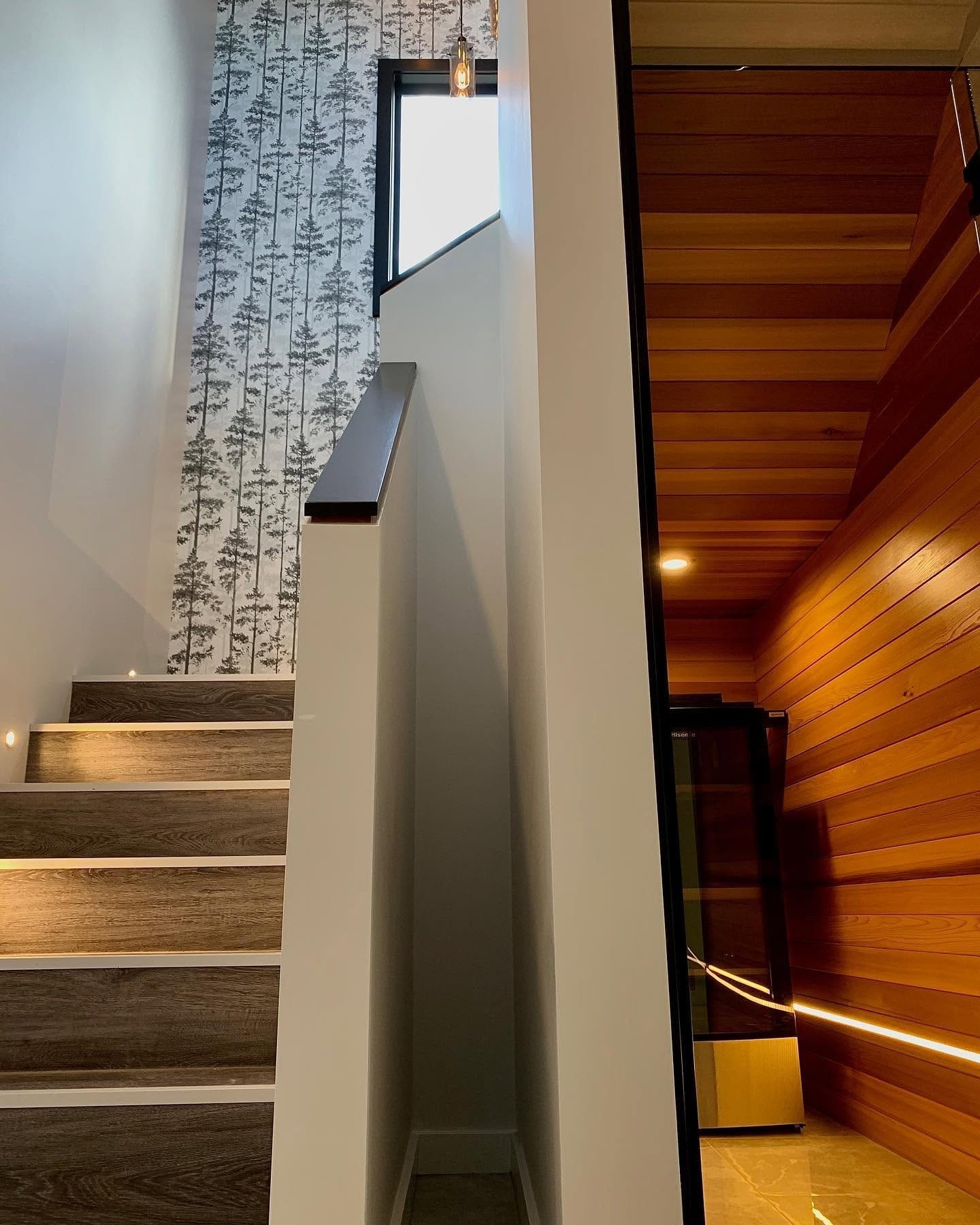 Stair and feature-wall tiling by Becks.