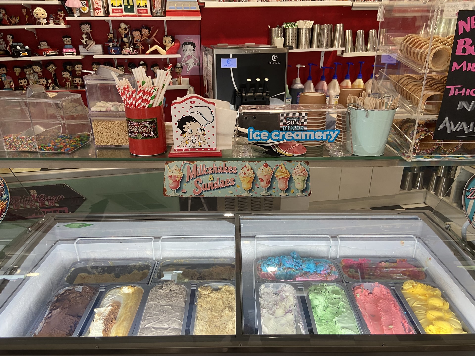 The ice creamery counter and gift shelves at the diner.