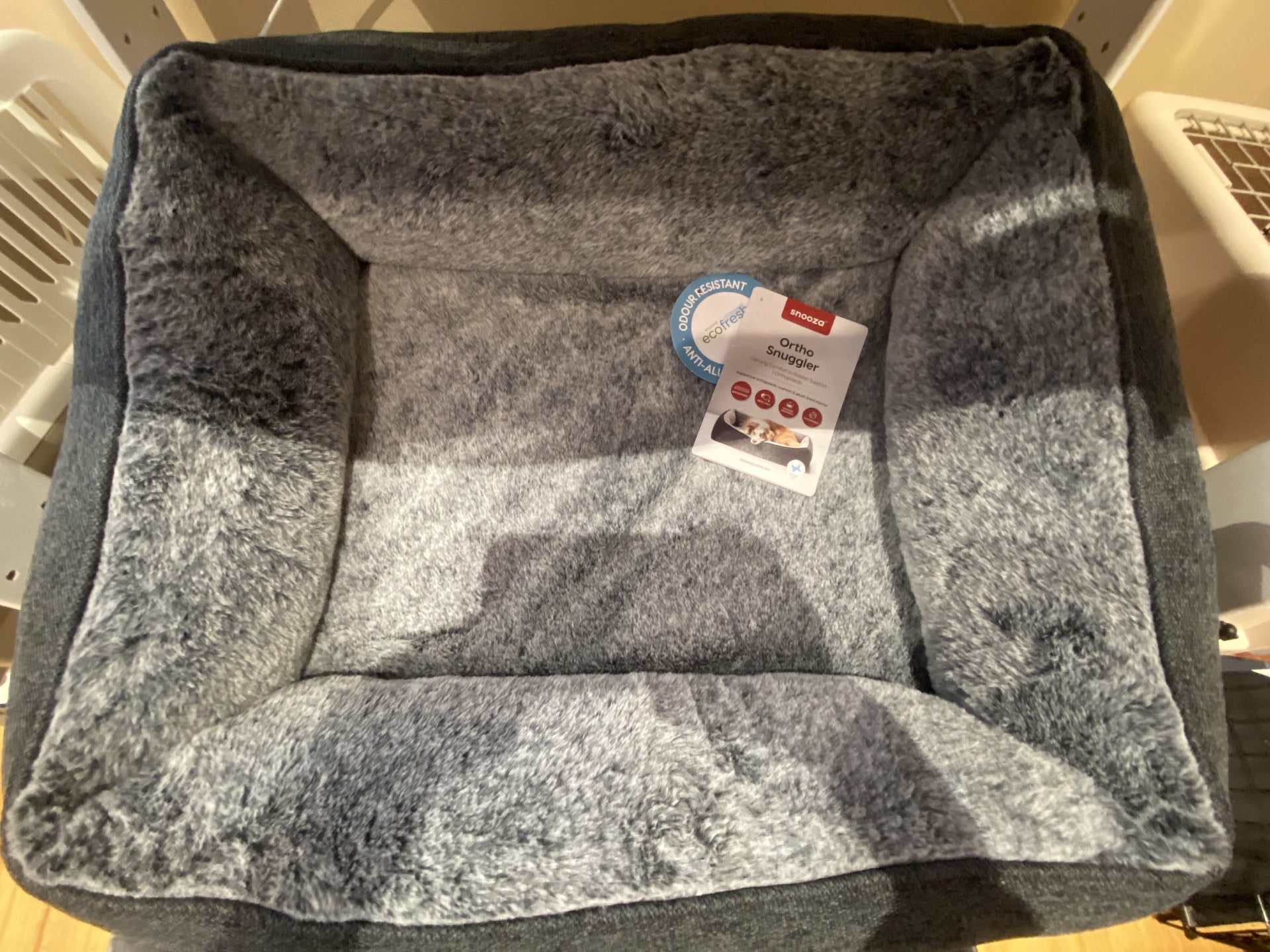 Dog beds on display inside For Pets Sake.