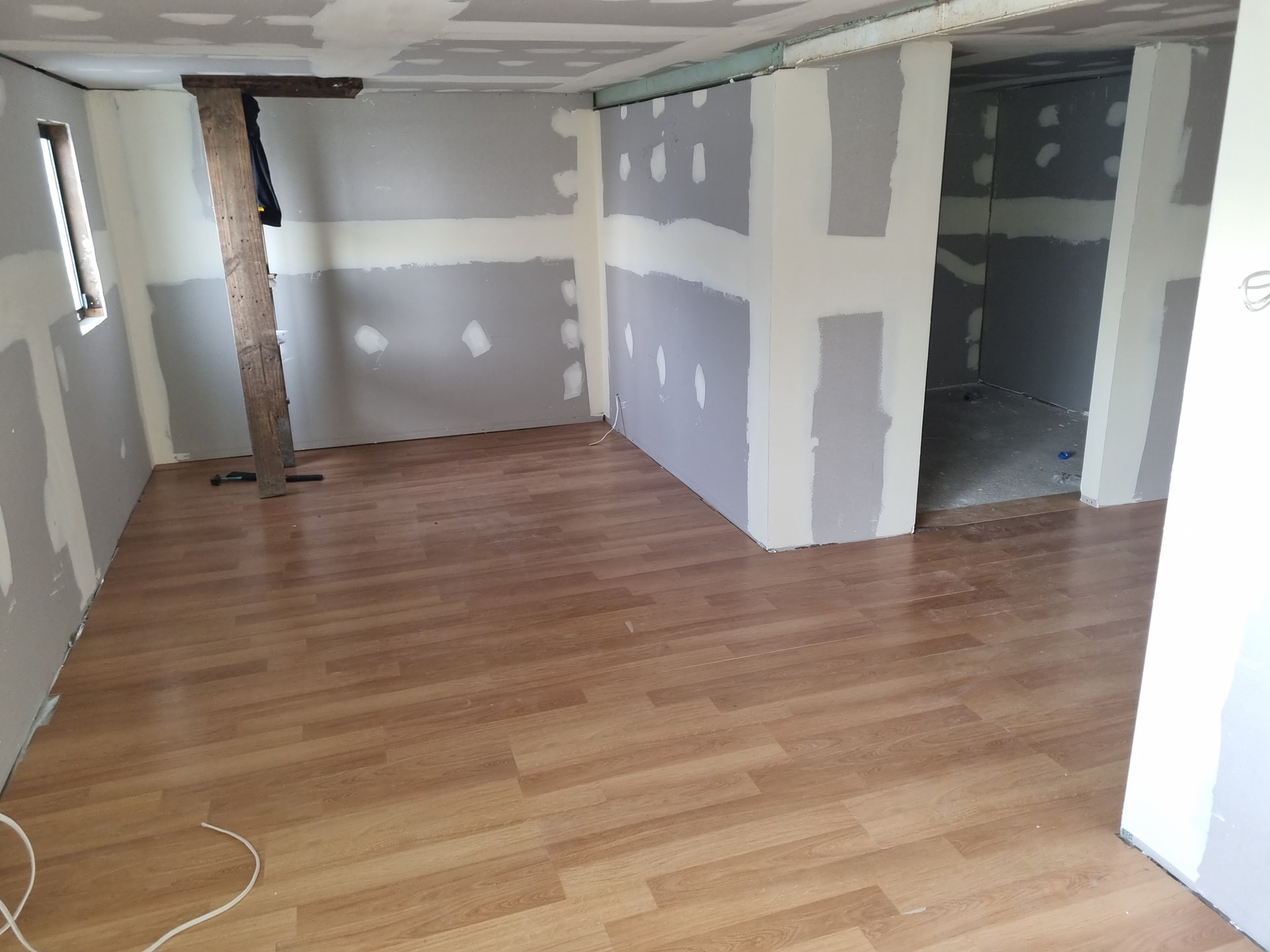 Plastering and a new floor in progress.