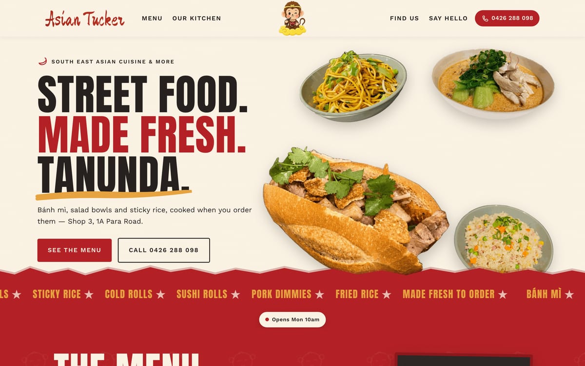 The new Asian Tucker homepage — street food made fresh in Tanunda, with the cheeky monkey peeking over the hero photo.
