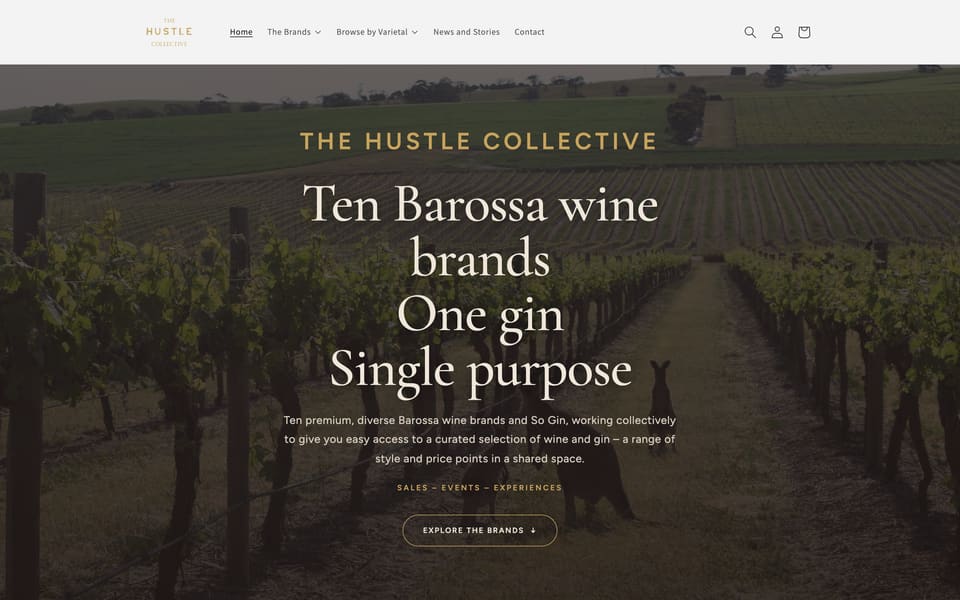 The Hustle Collective website homepage with vineyard rows, a kangaroo and the heading “Ten Barossa wine brands, One gin”