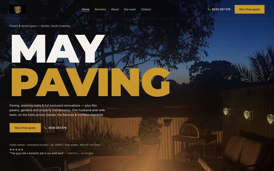 May Paving website homepage with large gold heading over a paved backyard at dusk with outdoor seating and lanterns