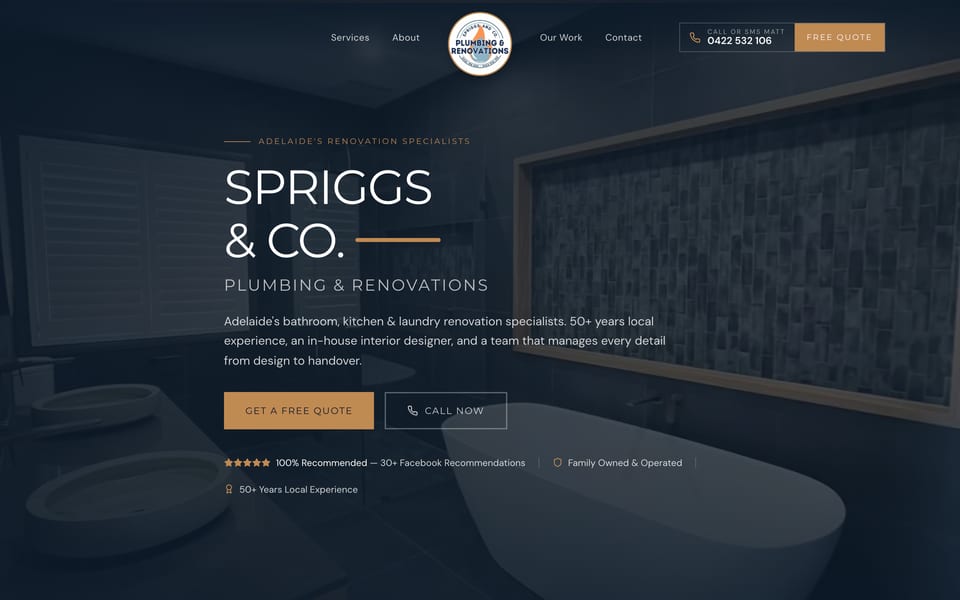 Spriggs & Co website homepage with dark renovated bathroom hero, freestanding bath and Adelaide renovation specialists