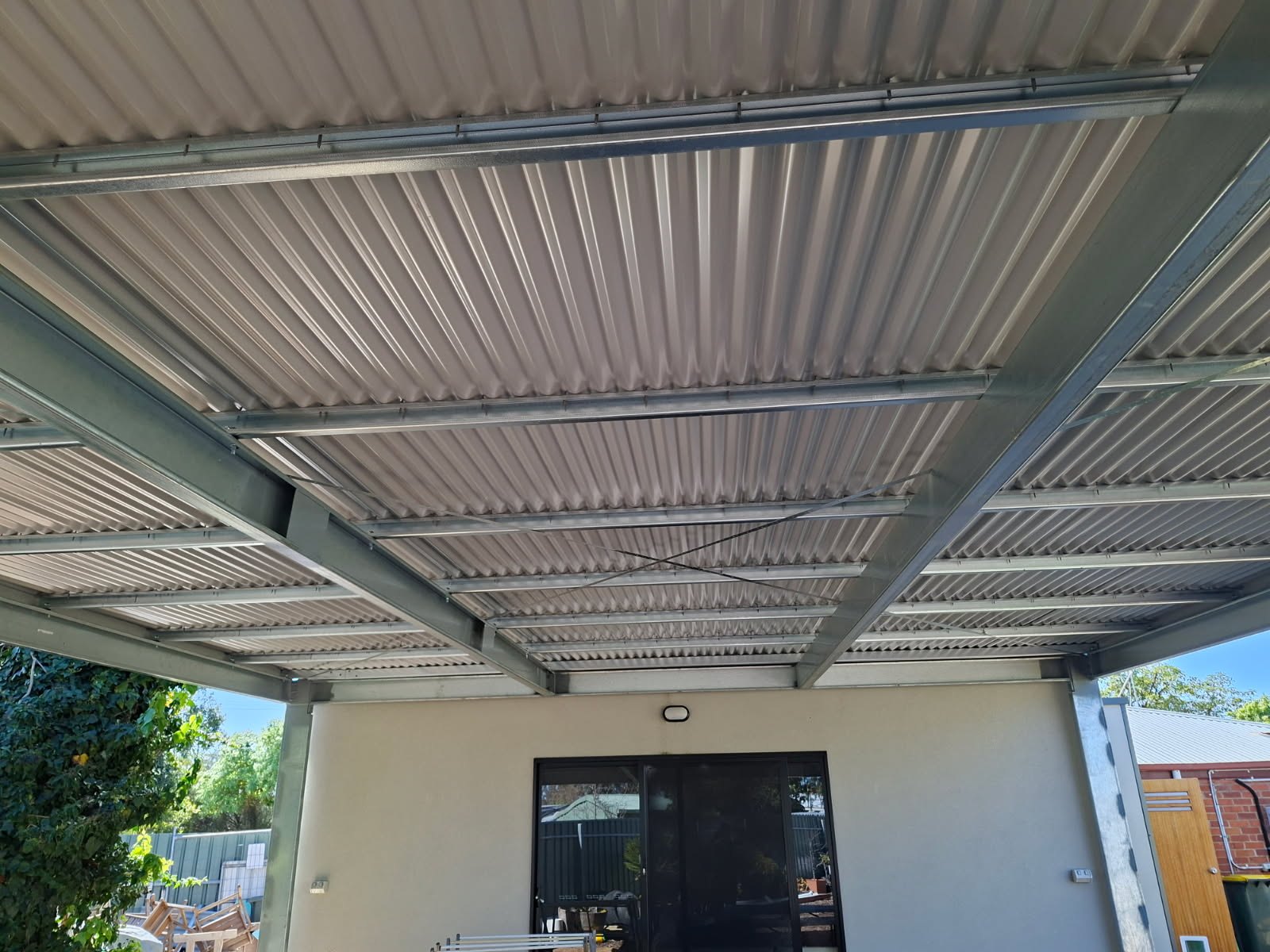 Looking up at a new steel pergola built by Iron Works in Tanunda, a JB Digital Barossa client.